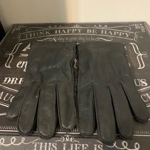 Men lined genuine leather gloves gently worn. Black large
